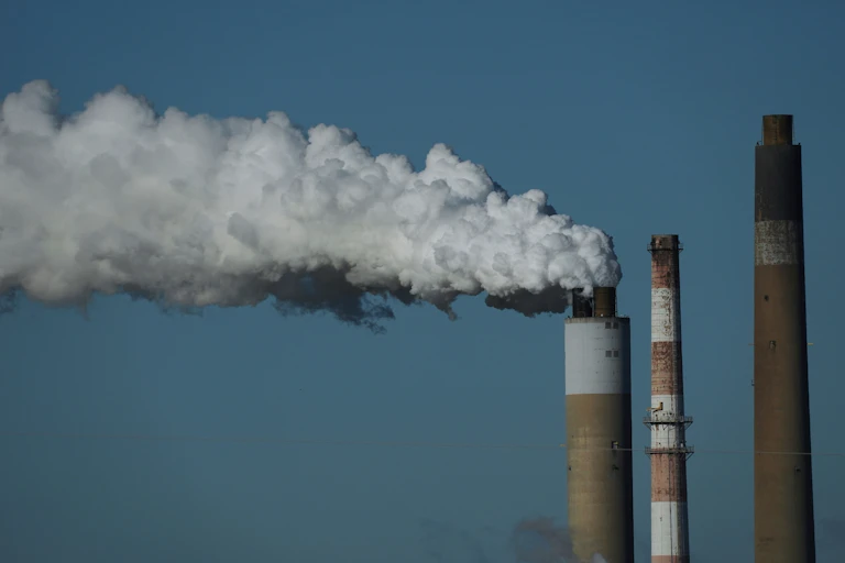 Factory chimneys sending up smoke