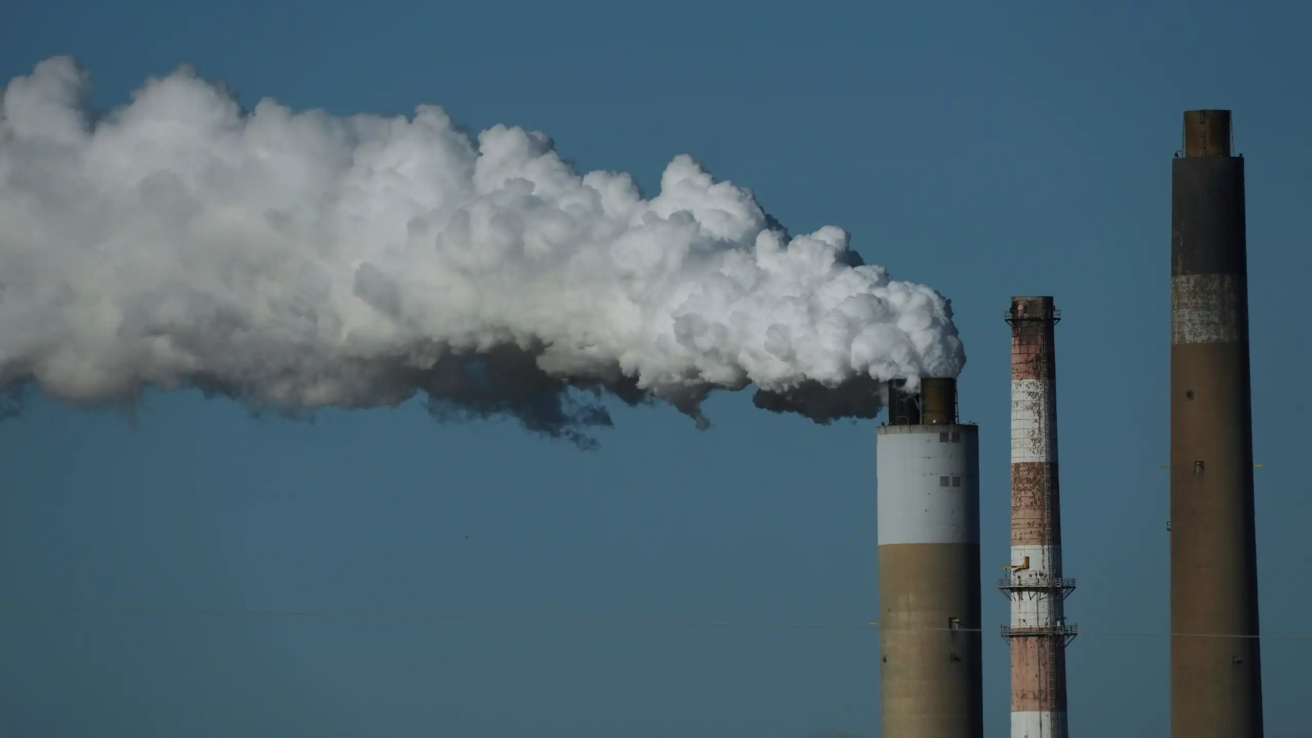 Factory chimneys sending up smoke