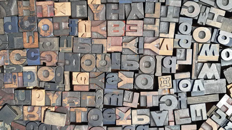 Close-up of assorted letter blocks.