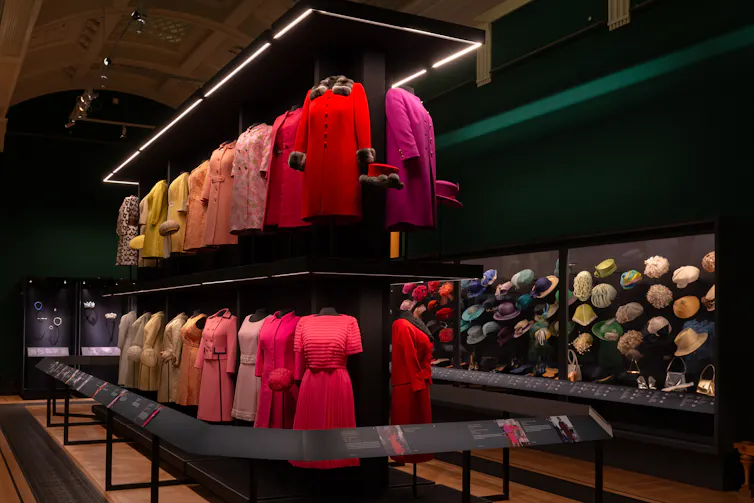 A colourful array of thats and coats at an exhibition.