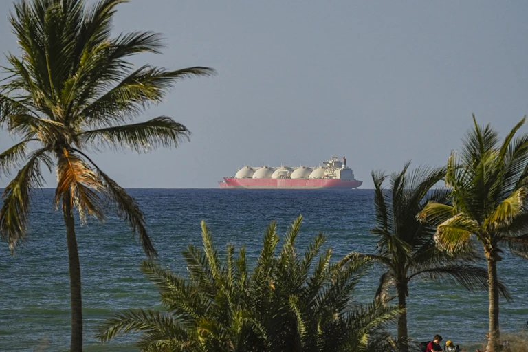 A large ship is seen at sea.