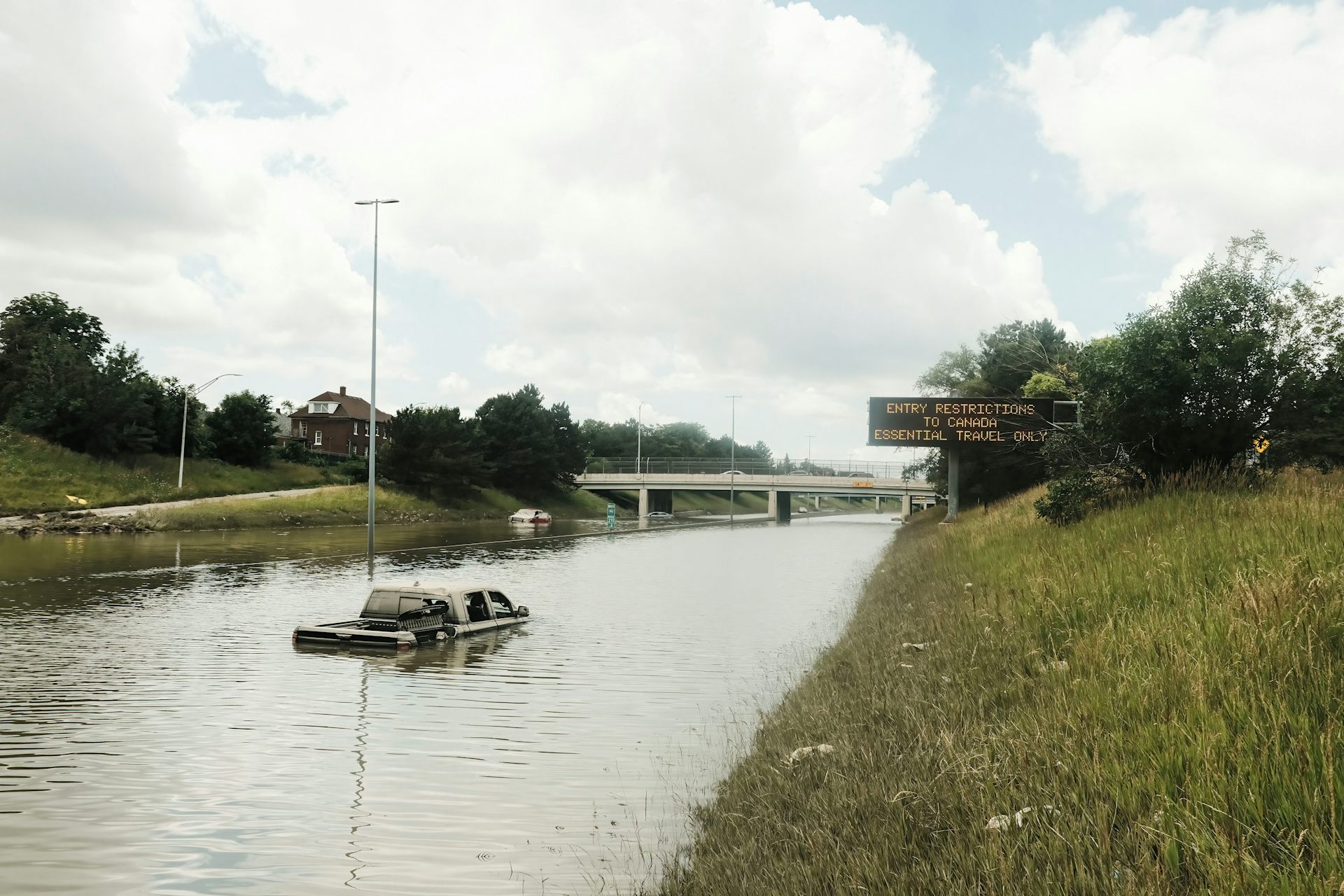 Truck stuck in flooded highway