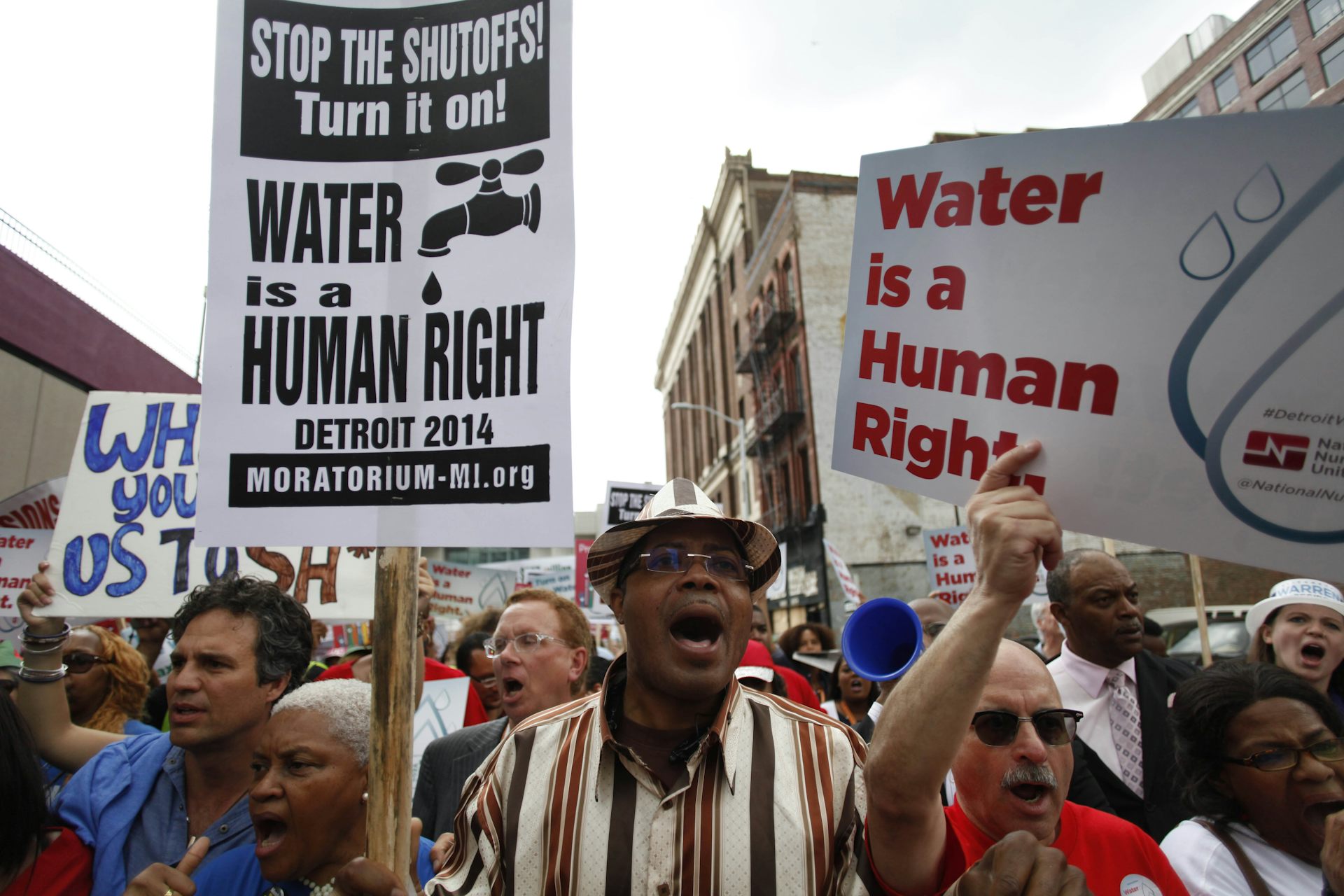 Protests march with signs
