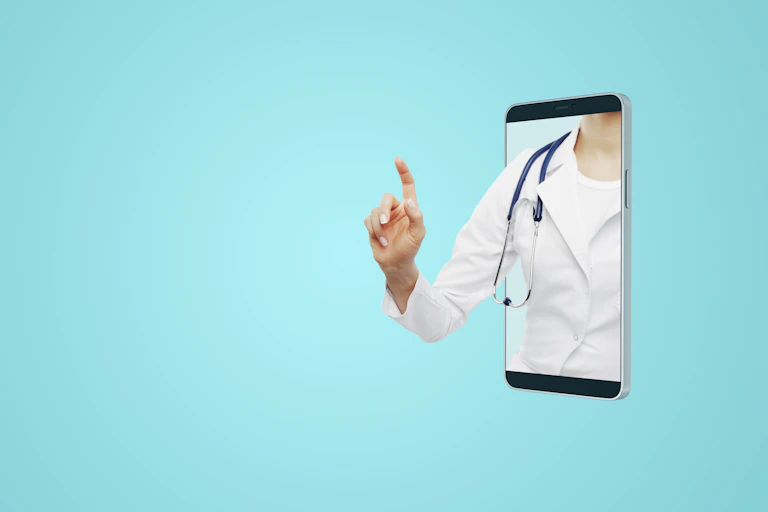 A doctor reaching through a mobile phone.