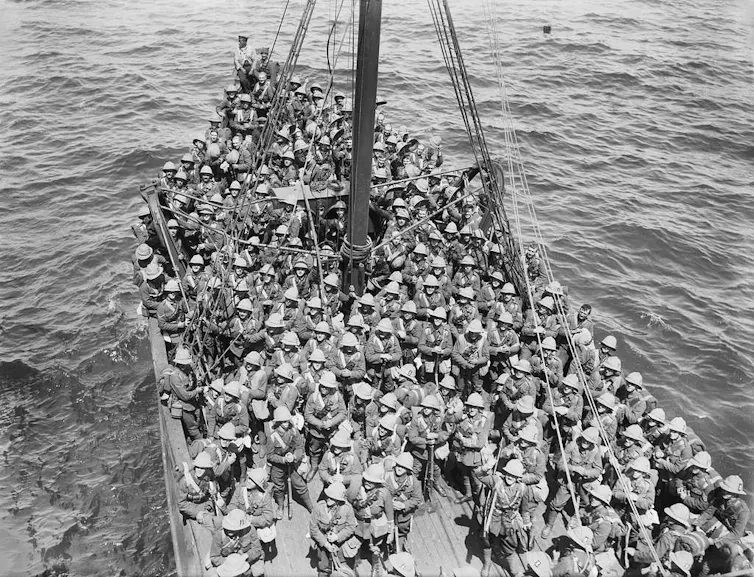 many men on a boat in the sea