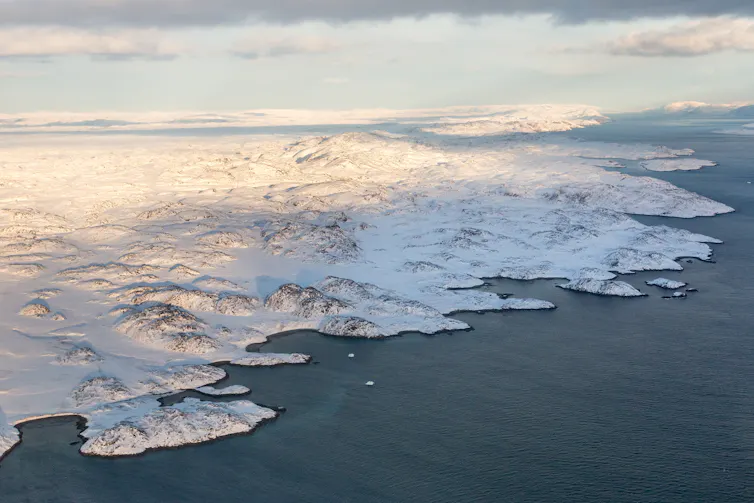 aerial shot of mountainous ice sheet