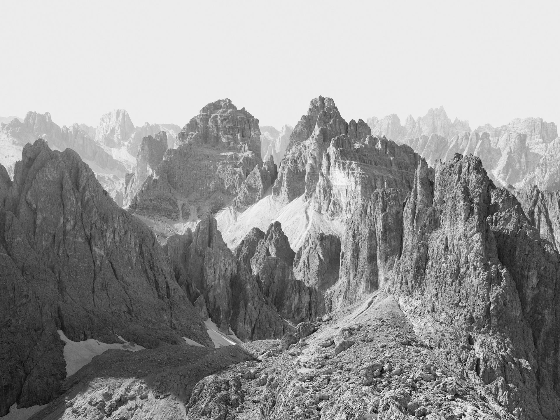 Black and white image of a mountain range.