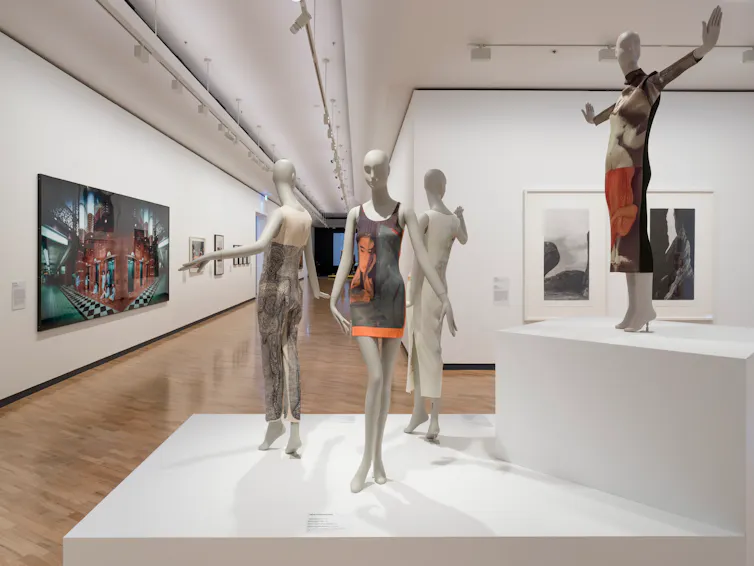 Mannequins wearing dresses.