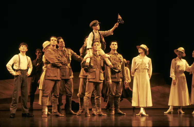 Ballet dancers dressed as diggers.