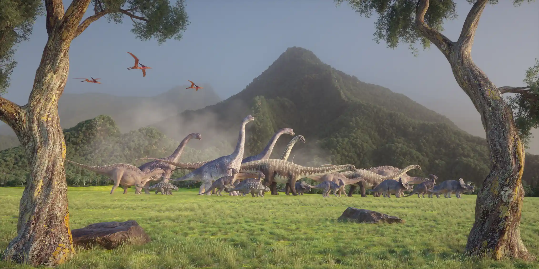 Illustration of dinosaurs walking in a valley.