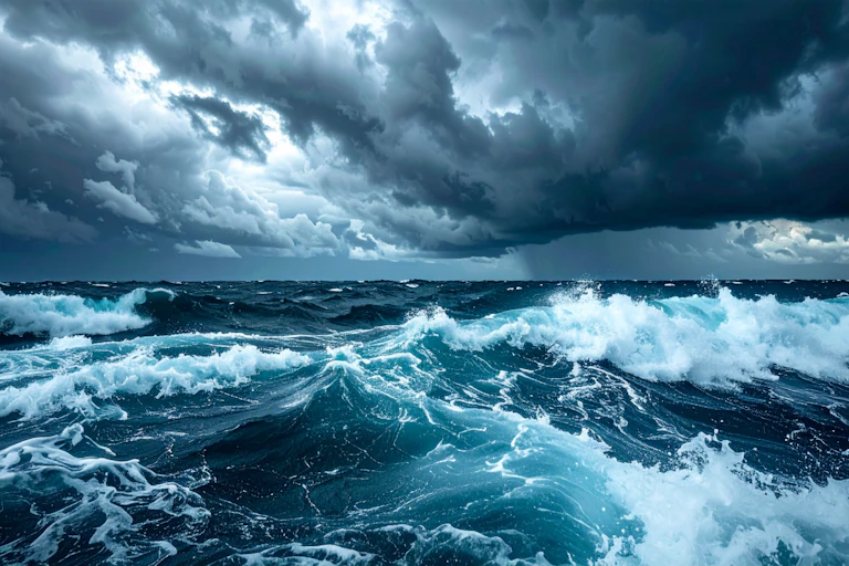 Stormy clouds over ocean waves