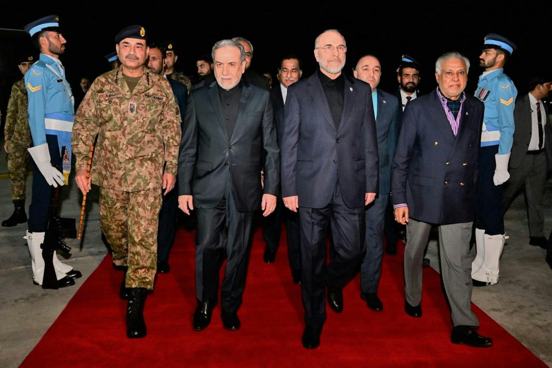 Iran's foreign minister, Abbas Araghchi, and parliamentary speaker, Mohammad Bagher Qalibaf, with senior Pakistani politicians as they arrive in Islamabad for talks, April 11 2026.