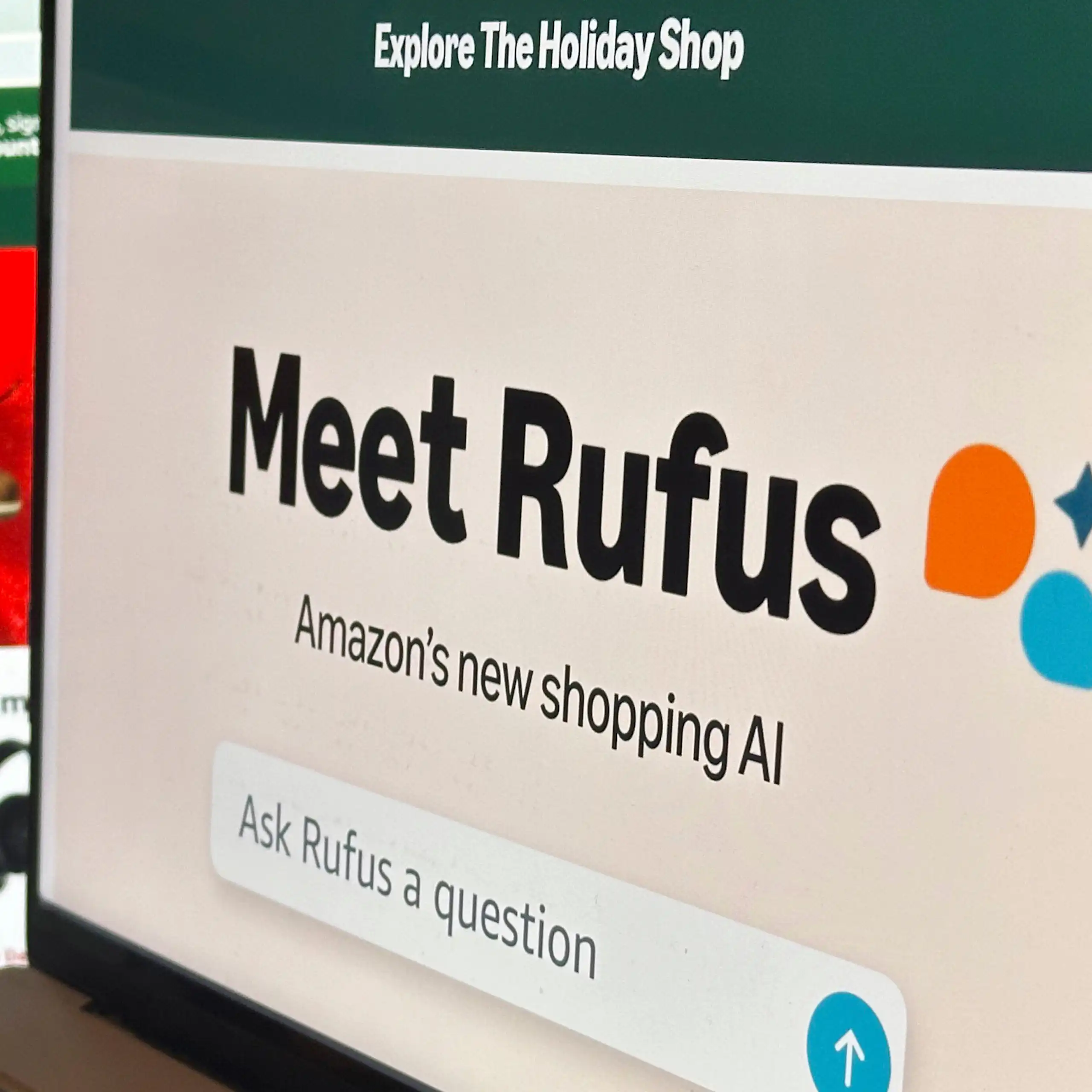 An image of Amazon's AI shopping assistant, Rufus, appears on a computer monitor to greet shoppers at a store in New York City.
