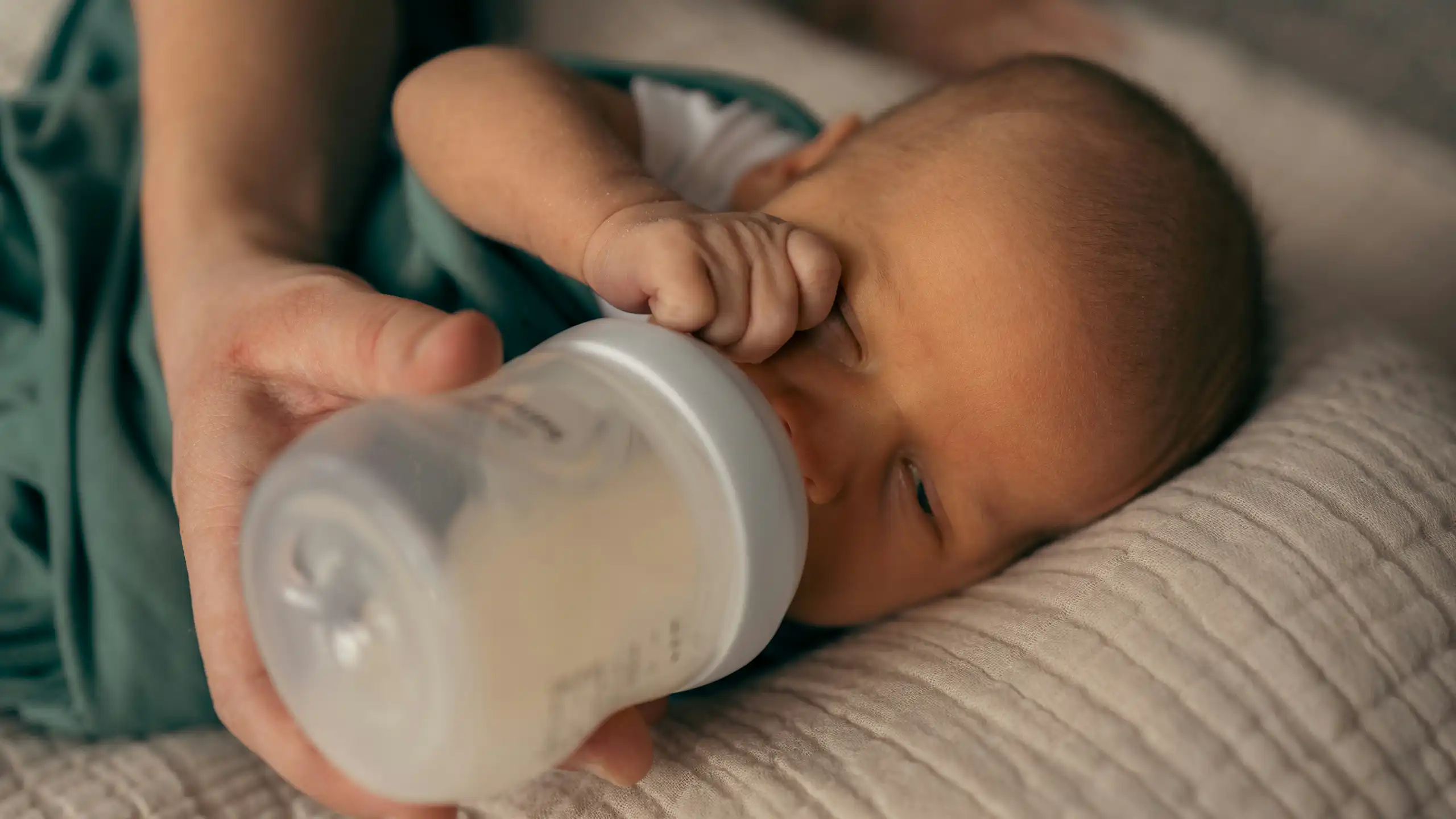 Baby drinking from a bottle
