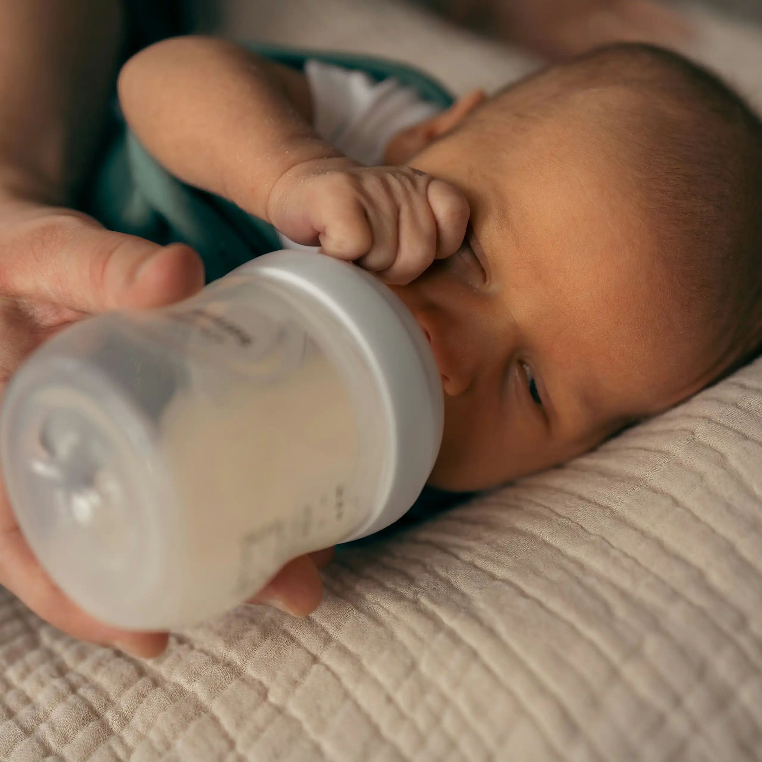 Baby drinking from a bottle