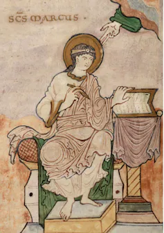 An old mural of a man in robes.