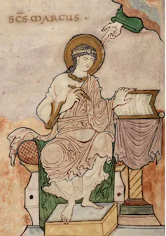 An old mural of a man in robes.