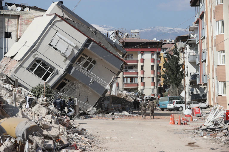 Toppled building in Hatay, Türkiye, near where a major earthquake stopped in 2023.