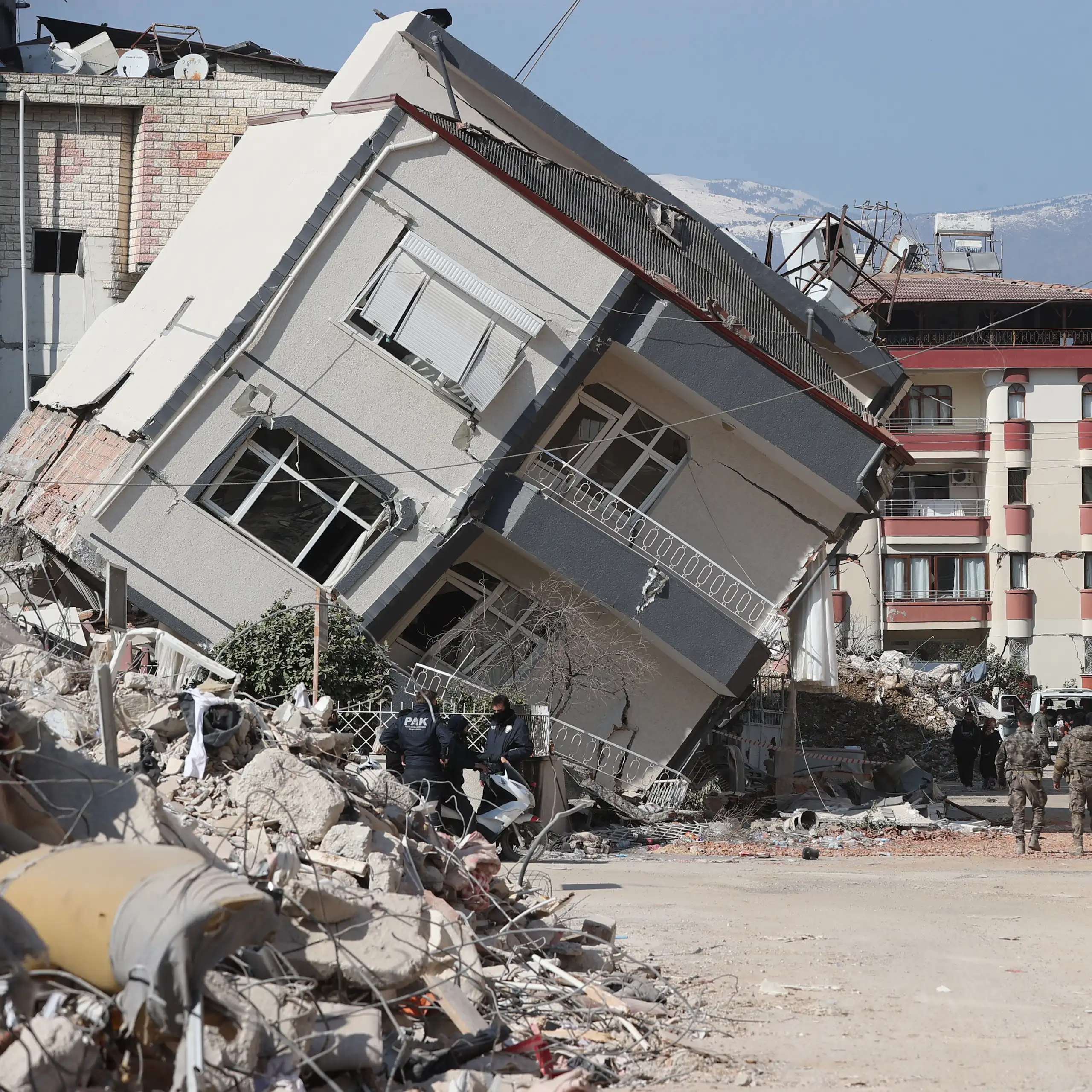 Toppled building in Hatay, Türkiye, near where a major earthquake stopped in 2023.