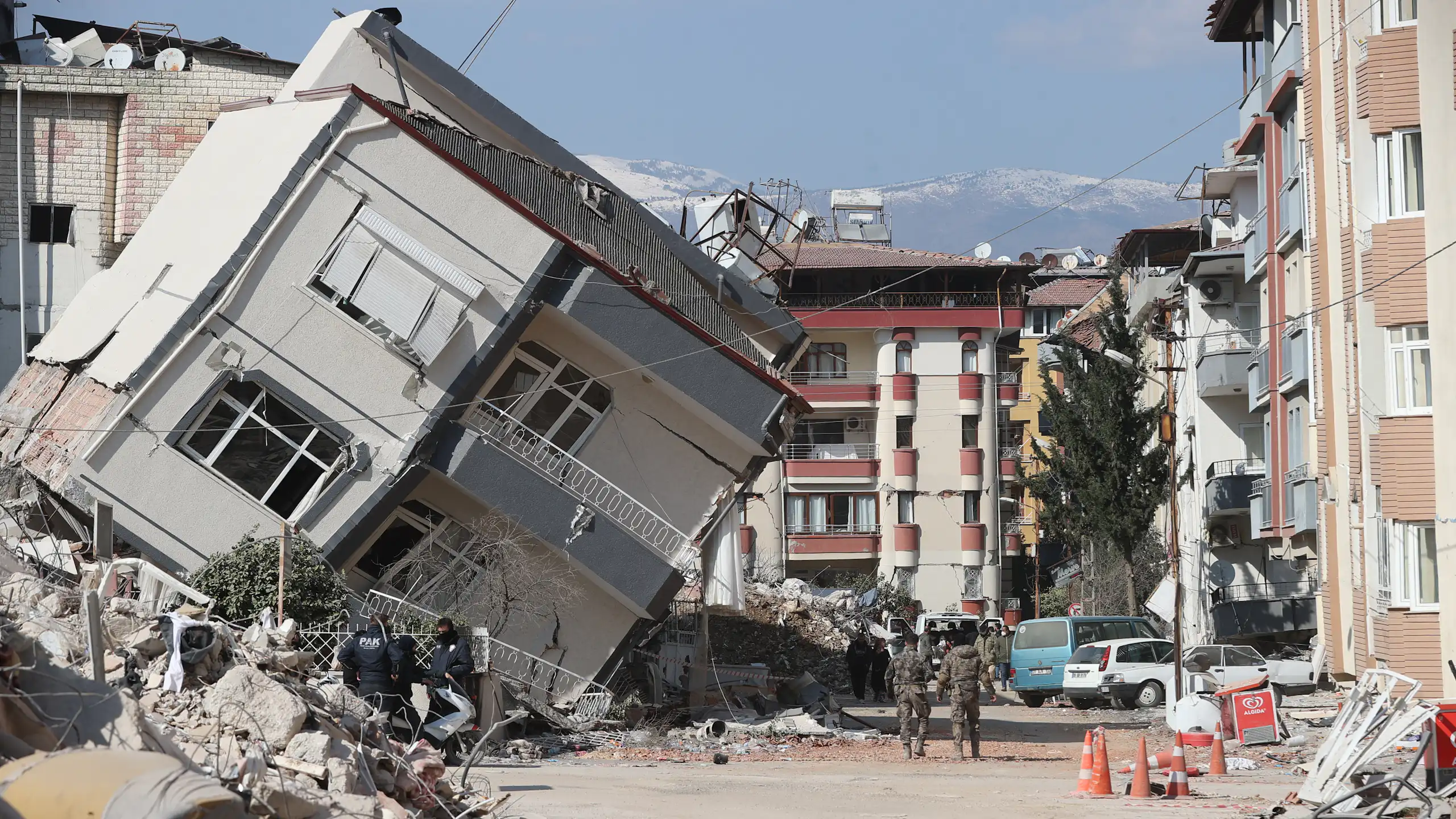 Toppled building in Hatay, Türkiye, near where a major earthquake stopped in 2023.