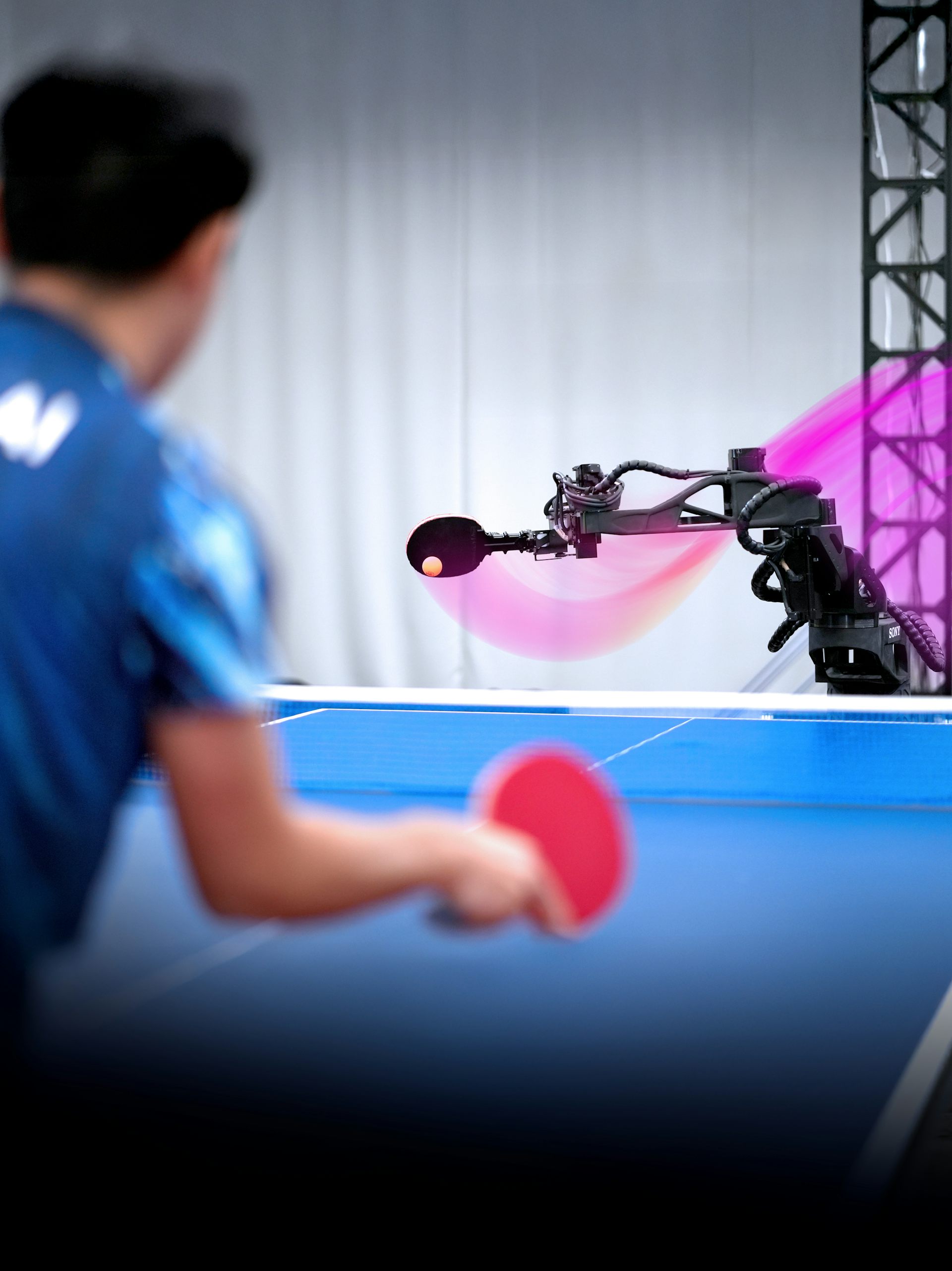 Robots Illuminate Limits and Insights into Human Sport