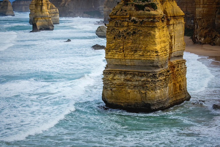Photo of a limestone stack rising from the sea