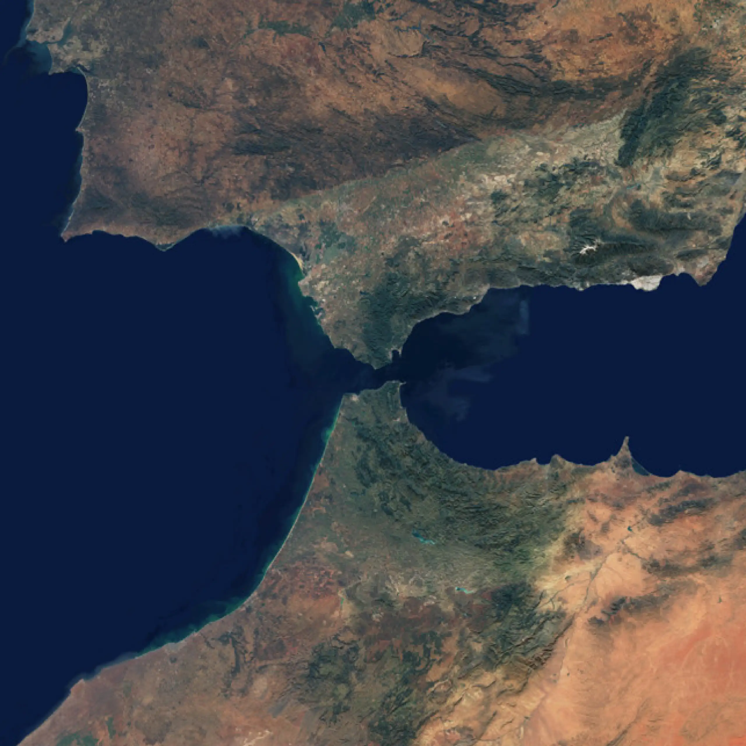 Satellite image of the western Mediterranean showing southern Iberia and northern Morocco, with the narrow Strait of Gibraltar between Africa and Europe.