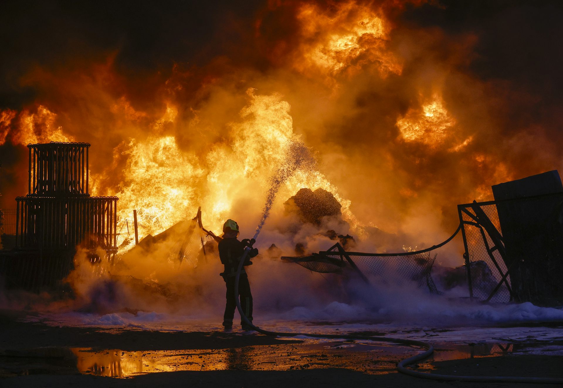 Ukrainian firefighters battle a blaze in Kyiv, APril 16 2026.