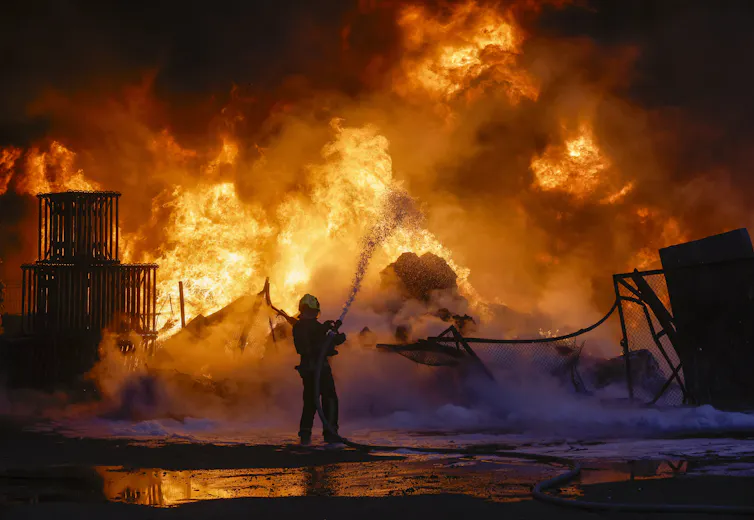 Ukrainian firefighters battle a blaze in Kyiv, APril 16 2026.
