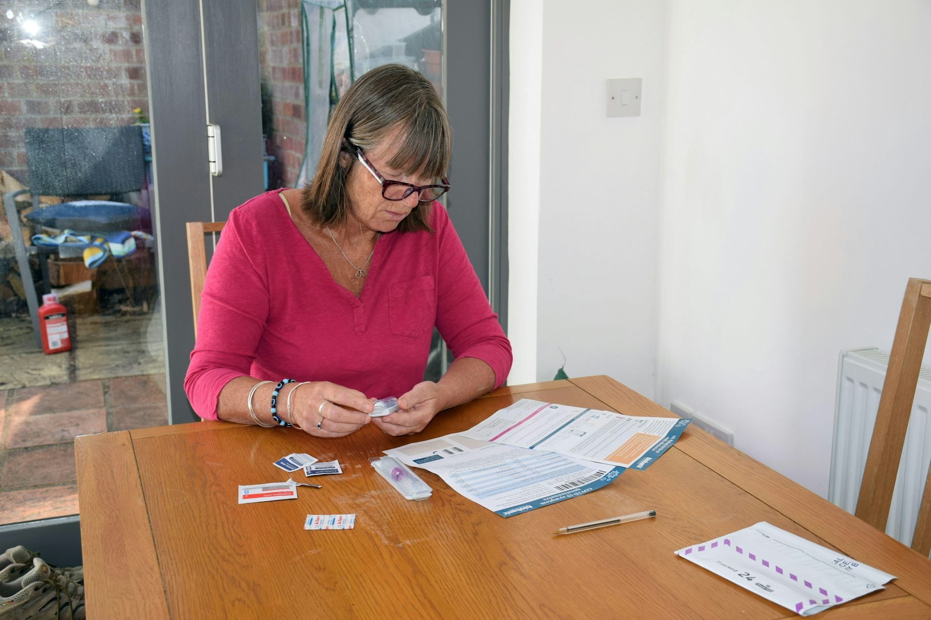 A woman taking part in UK Biobank coronavirus research.