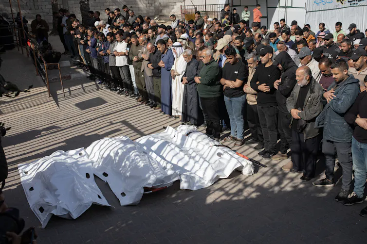 A funeral for victims of an Israeli airstrike in Gaza, April 2026.