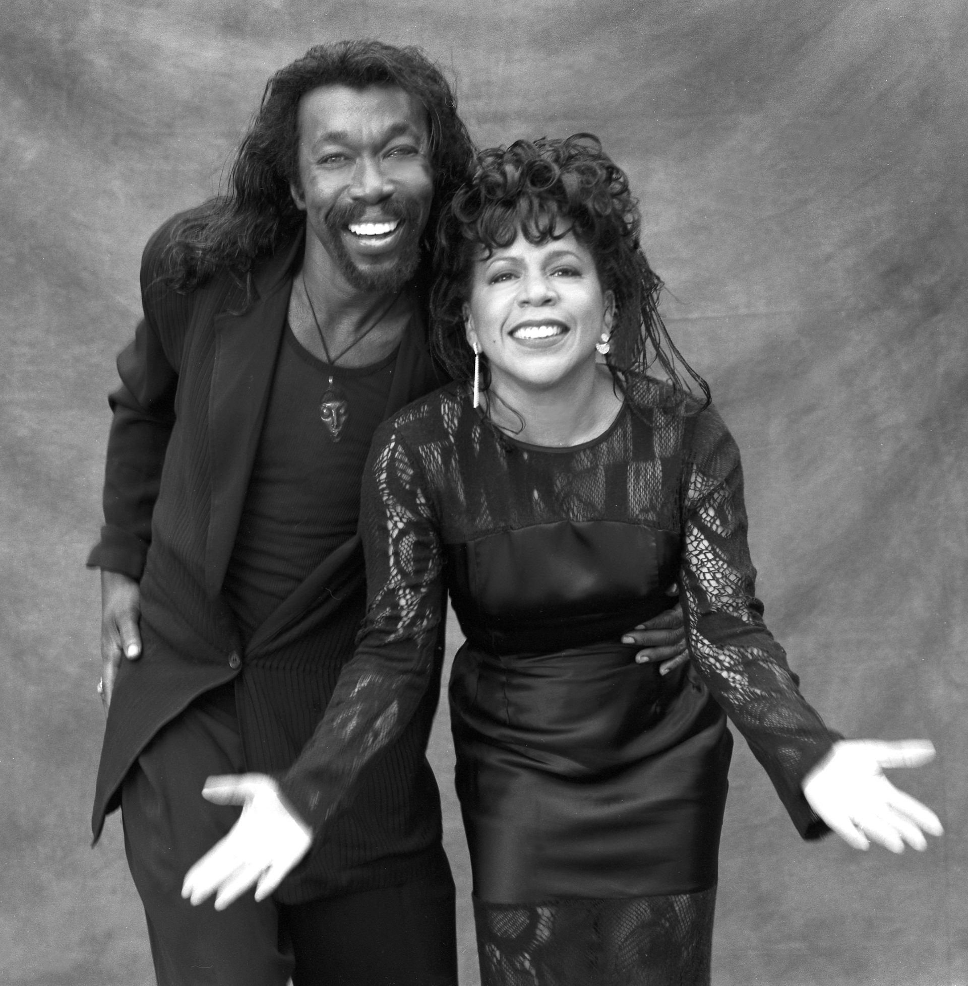 A man and a woman stand for a portrait