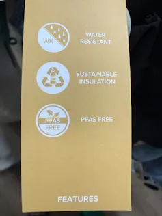 A clothing label claiming to be water resistant, sustainably insulated and PFAS free.