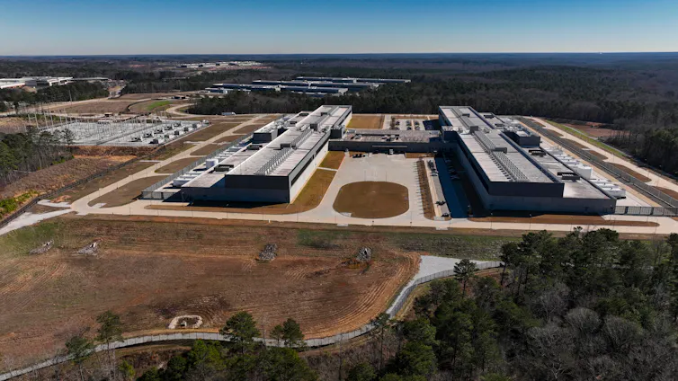 aerial view of a pair of sprawling industrial buildings