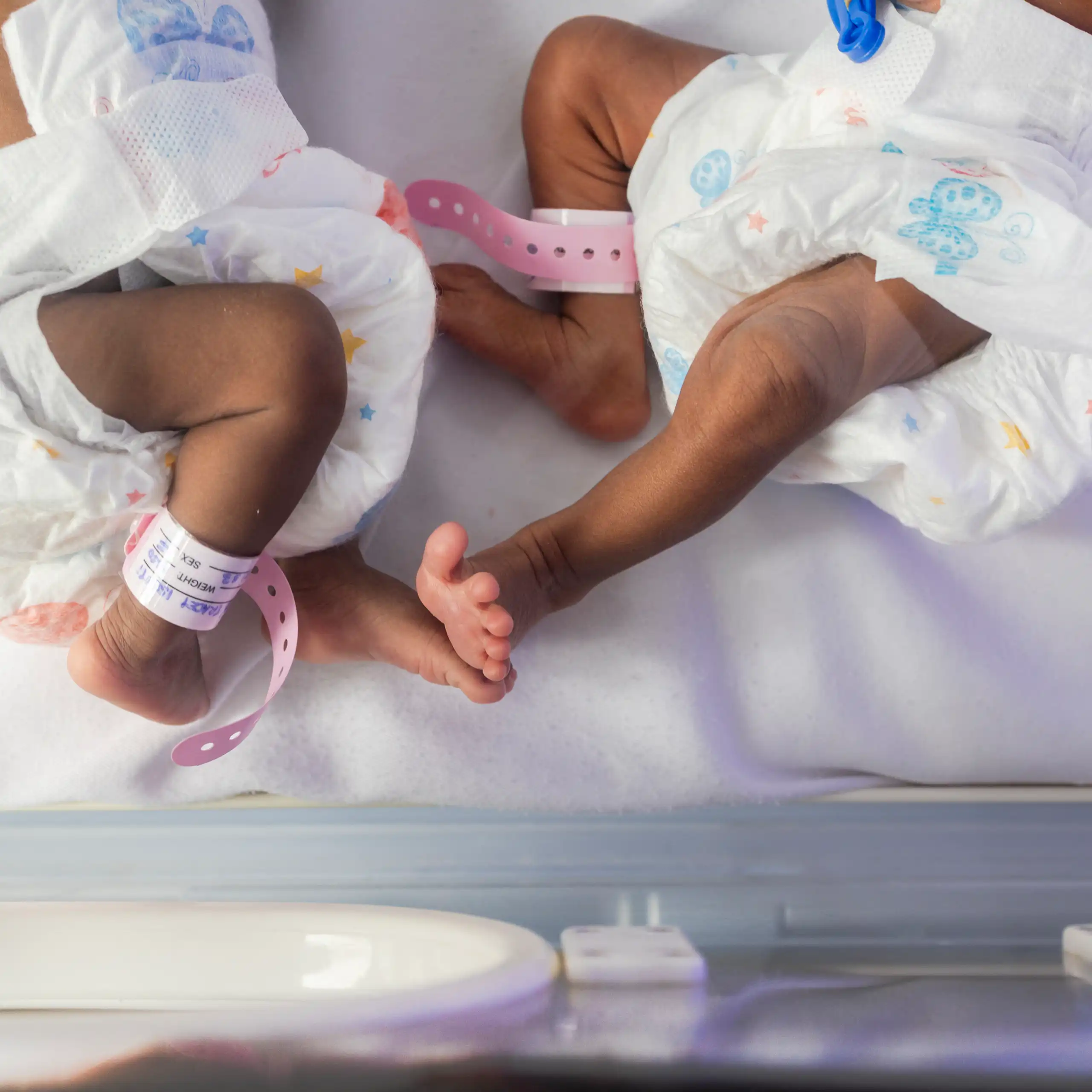 Two babies in an incubator