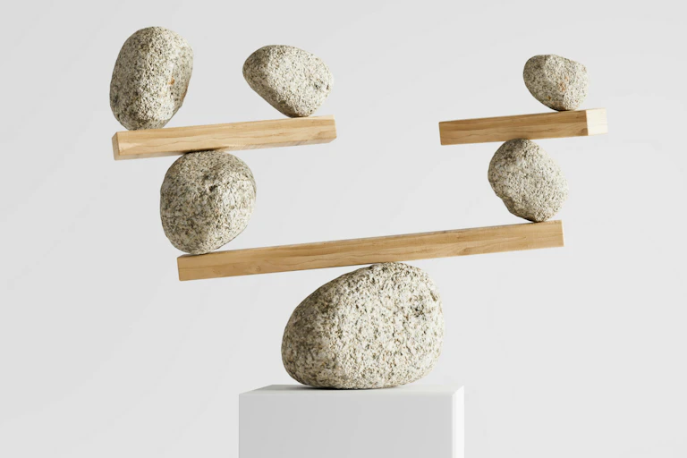 Stones seen on balance scales.