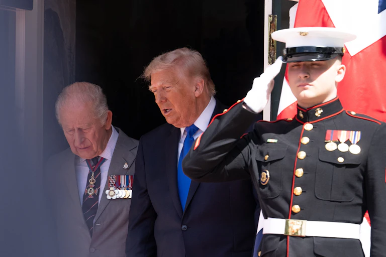 Trump and Charles speaking as they exit the White House