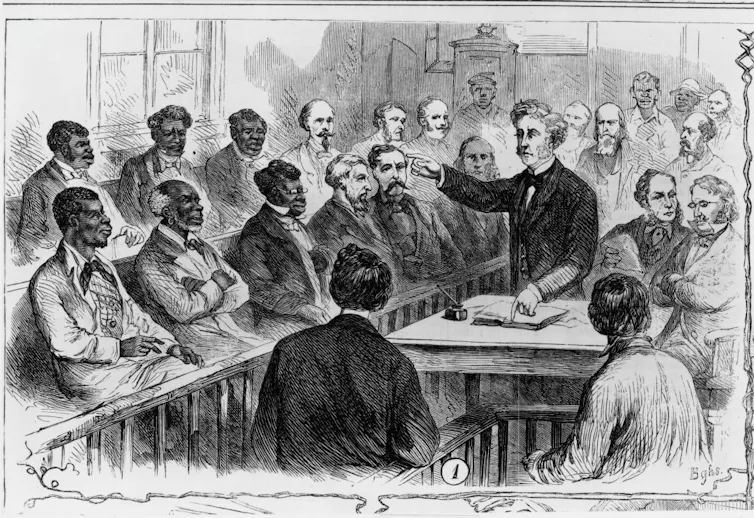 A sketch shows a crowded room with two rows of seated men, some Black and some white, as a white man points at them and speaks.