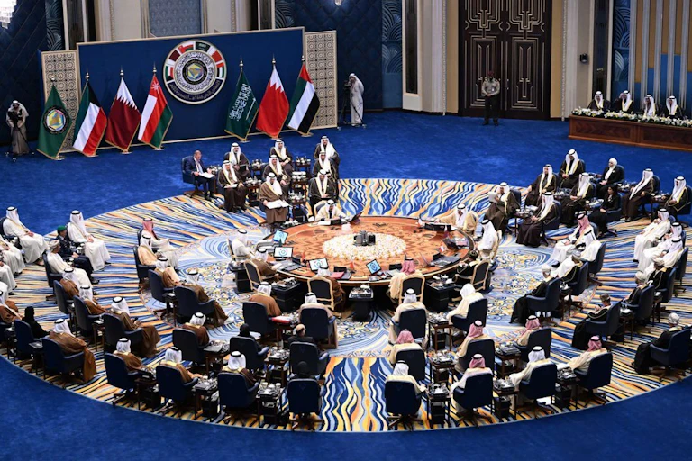 People sit in a circle formation