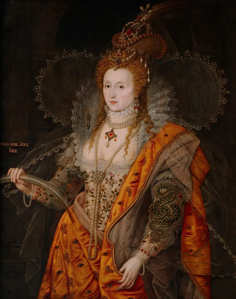 Portrait of Elizabeth in a vibrant orange dress