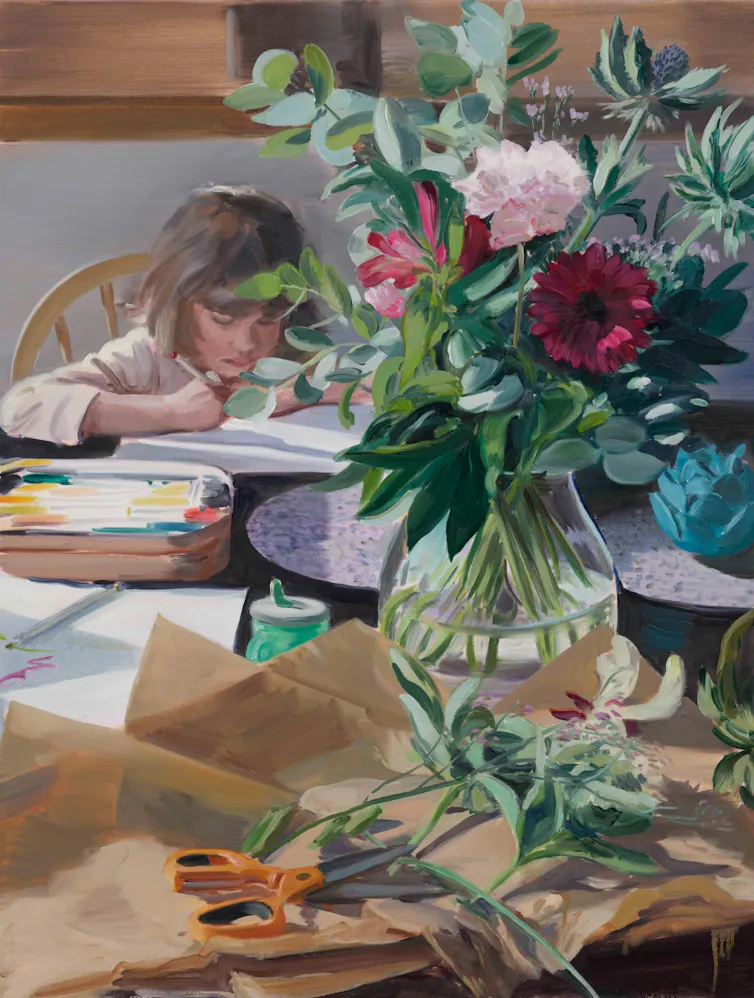 Painting of a young girl drawing at a kitchen table, in the foreground is an unfinished bouquet of flowers, midway through being arranged.