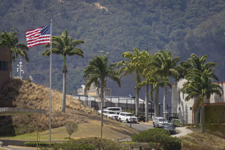 The US flag raised outside the US embassy in Venezuela.