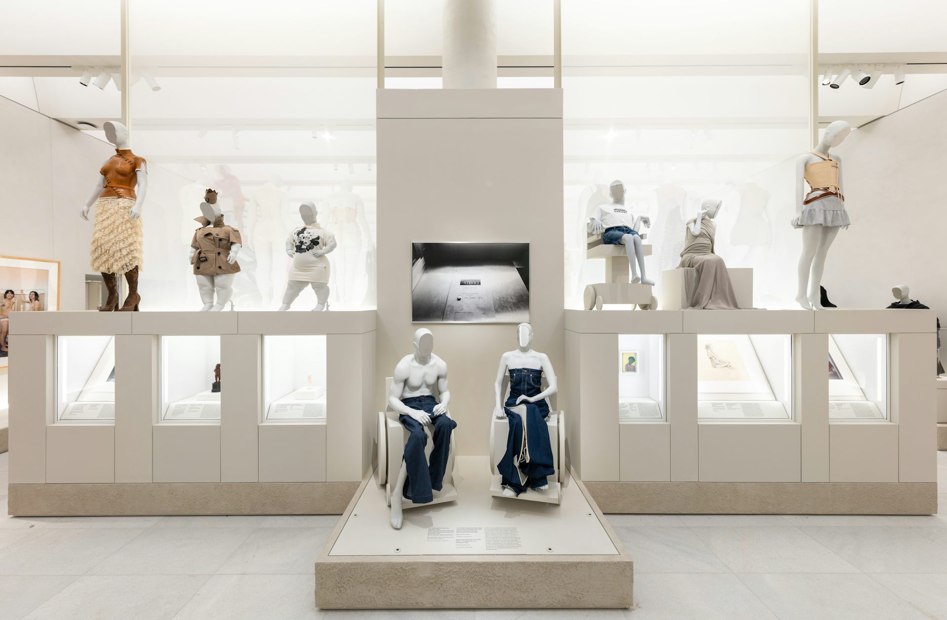 A museum space showing disabled mannequins modelling clothes.