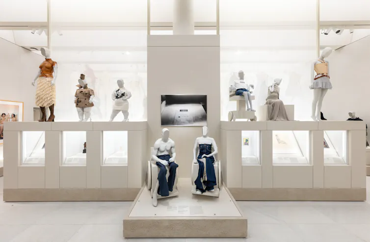 A museum space showing disabled mannequins modelling clothes.