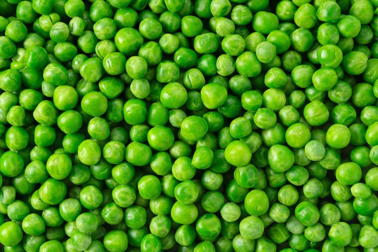 A close-up shot of cooked peas.
