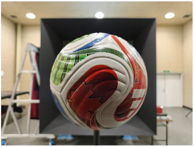 A ball is seen suspended.
