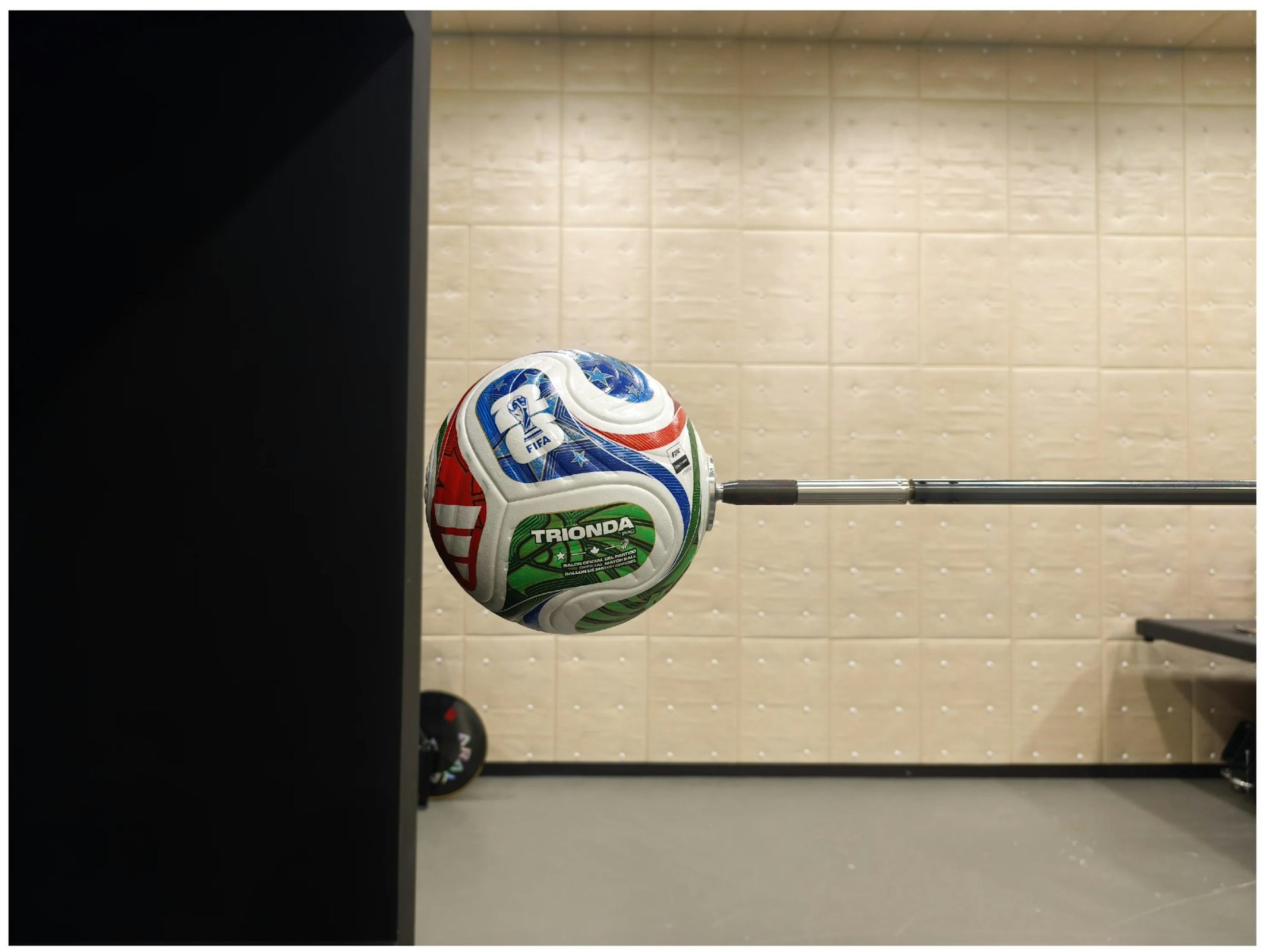 A ball mounted on a rod.