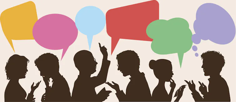 Silhouettes of people with colorful speech bubbles above them are seen in a cartoon image.