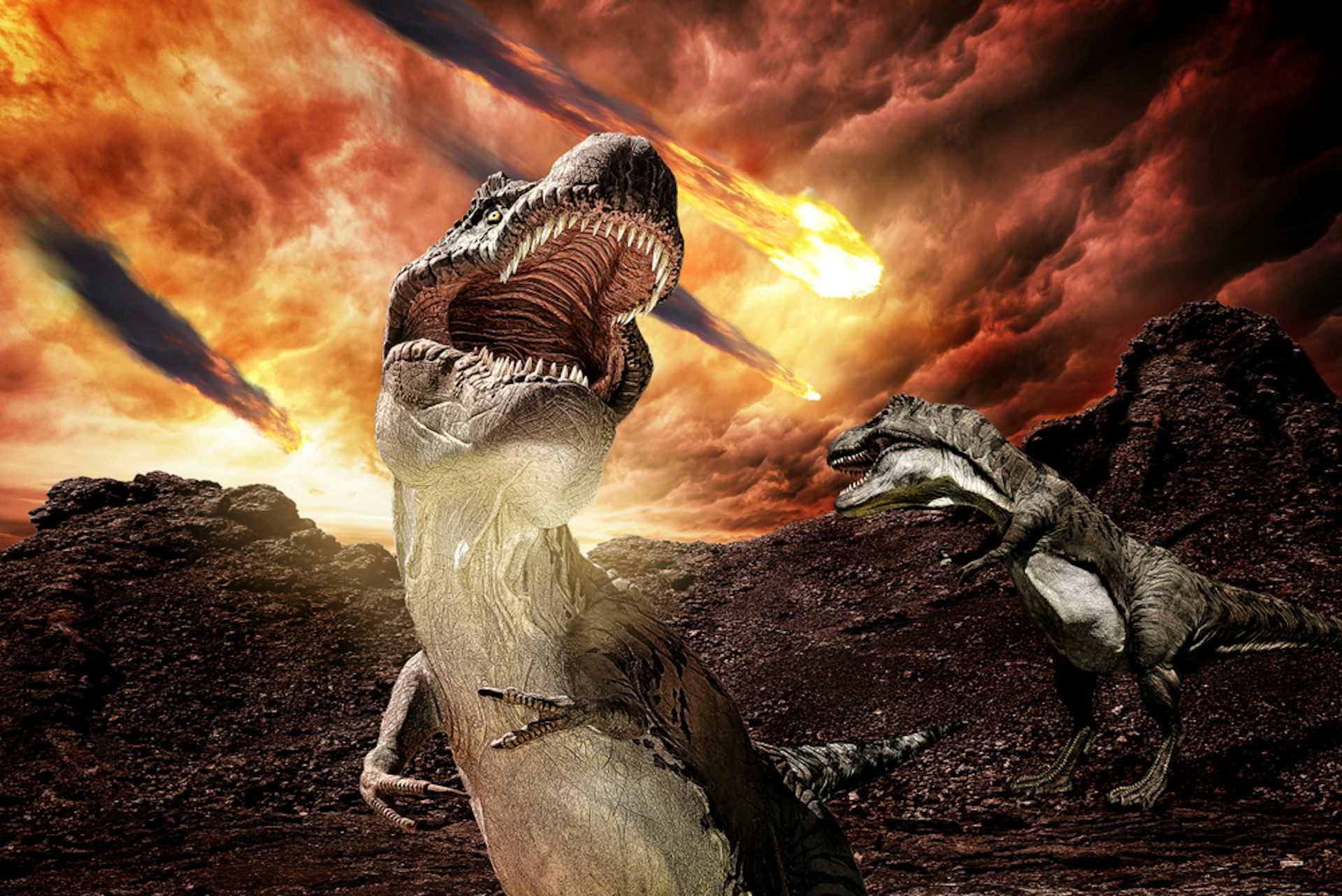 Dinossauros com uma bola de fogo ao fundo.