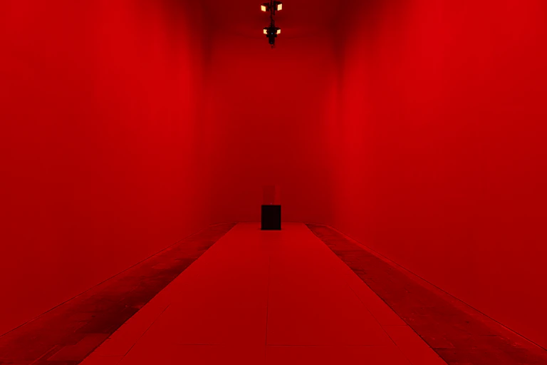 A corridor bathed in red light